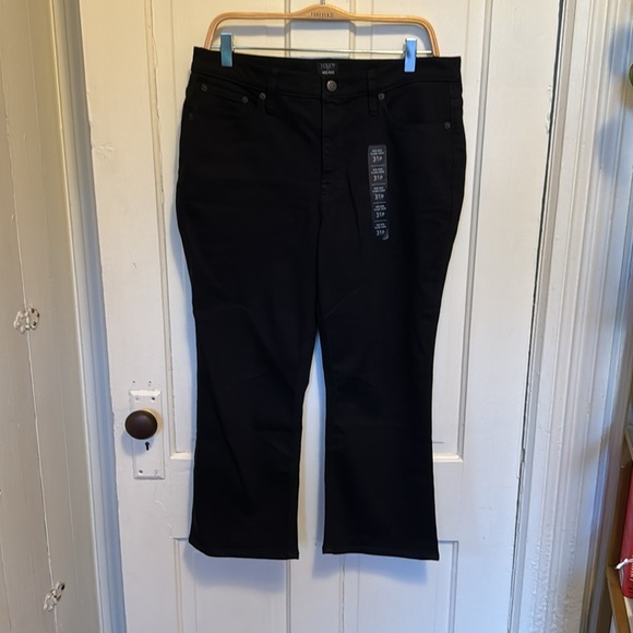 J. Crew Factory Petite Mid-Rise Flare Crop Jean with All-Day Stretch in Black - Picture 2 of 8